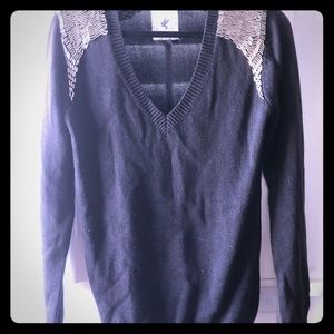 V neck black sweater with shoulder beading